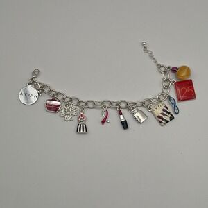 Avon Charm Bracelet 125 Years Anniversary Lipstick ANEW Breast Cancer Jewelry
